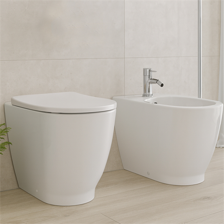 Coppia sanitari vaso bidet e coprivaso rallentato geberit acanto a terra rimfree